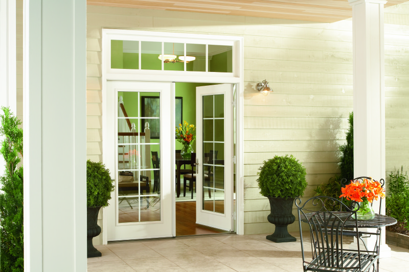 French patio doors with white trim and transom windows across the top.