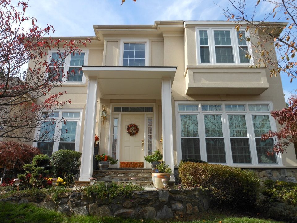 new windows and doors in the front of a Potomac house